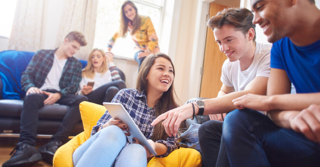 University students happy in their new student letting accommodation in the UK